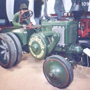 Tractor with spring wheels