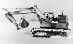 e-4121-excavator-on-pneumatic-tracks.jpg