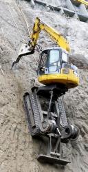 Komatsu excavator on steep slope