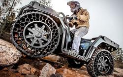 Polaris sportsman with airless tires